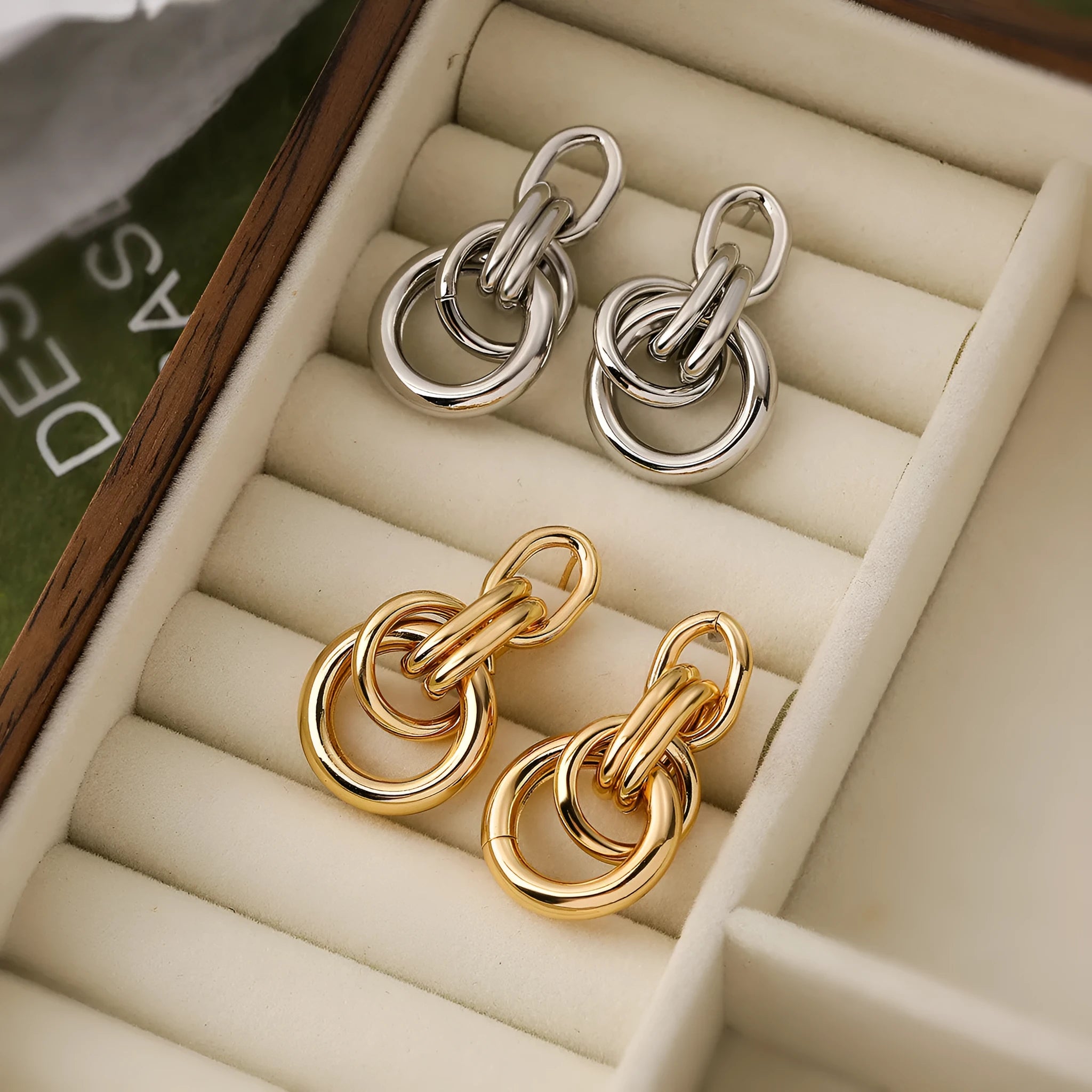 Geometric copper earrings with irregular shape in gold colour options 44093 and 44094