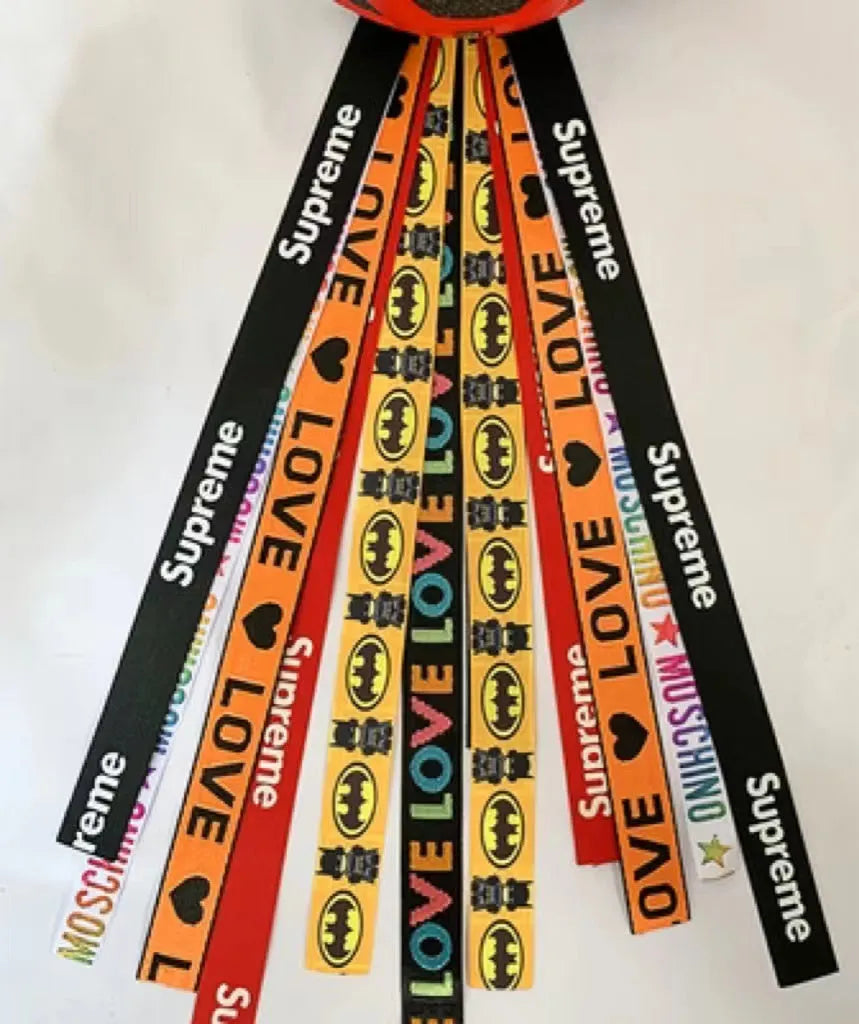 Decorative ribbon streamer for a child's ski or skating helmet in various colour options.