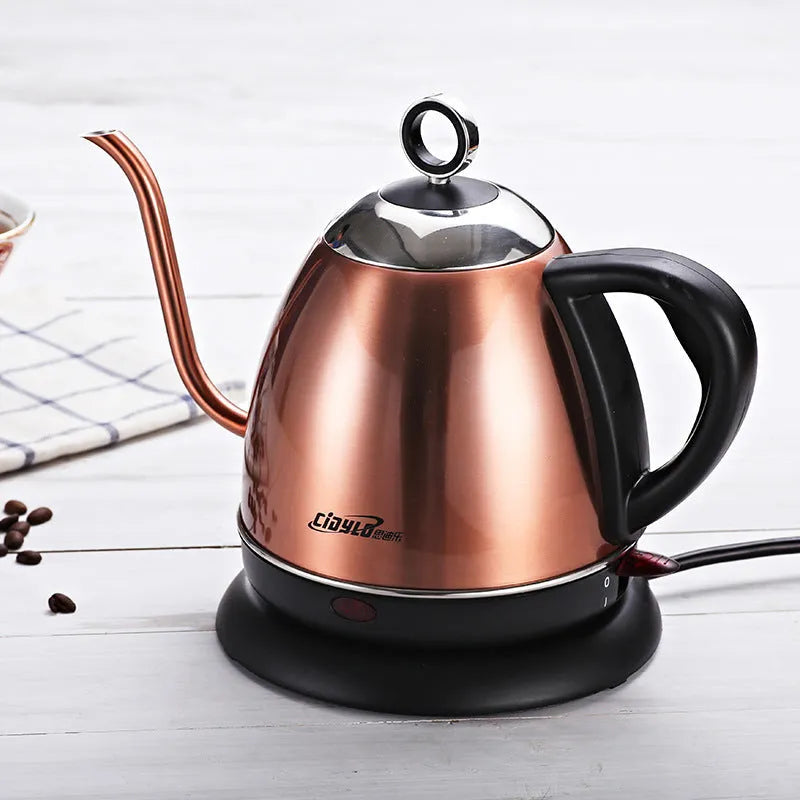 Gold full-automatic stainless steel kettle with touch control panel on a kitchen counter.
