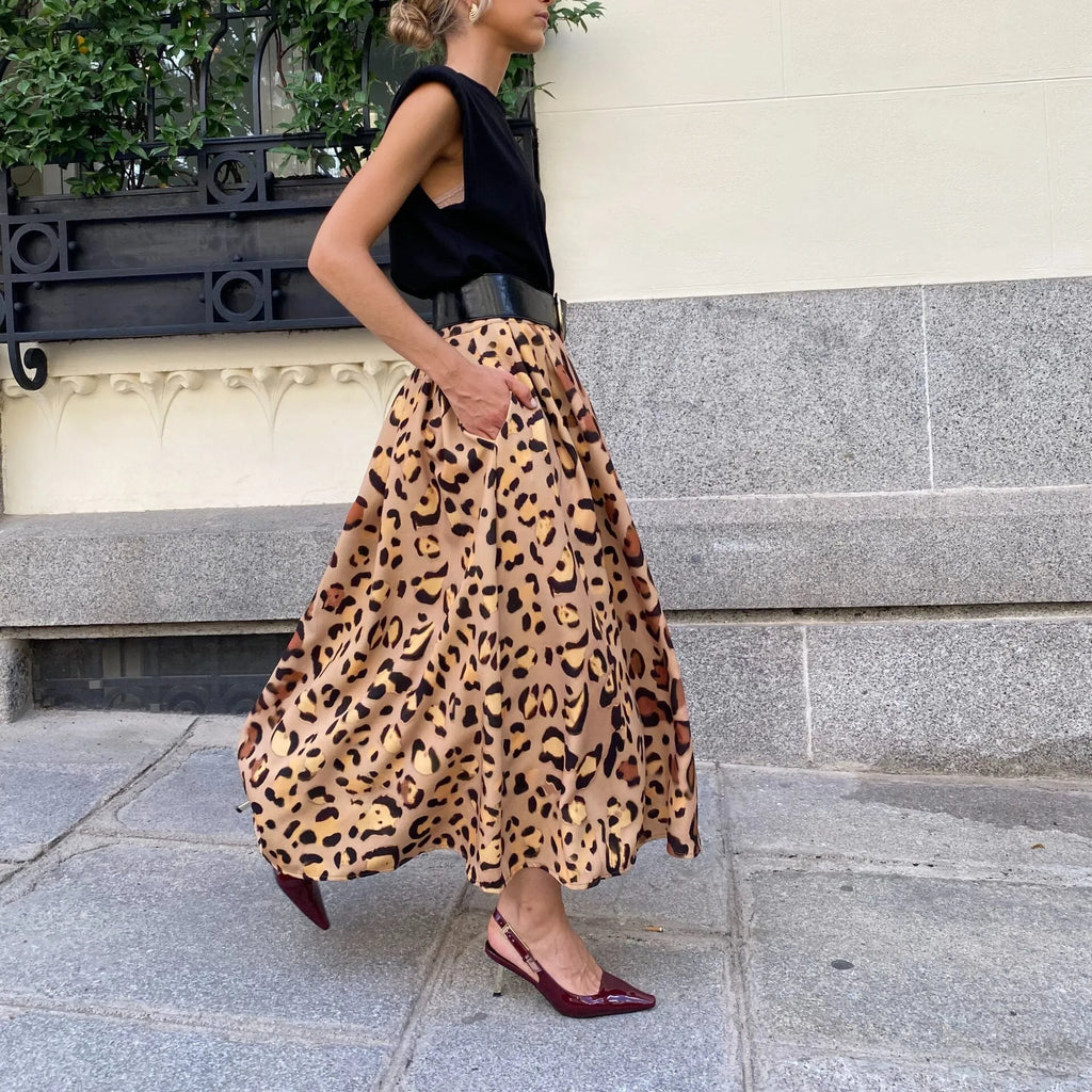 Brown leopard print women's A-line skirt with a long length and big flowing hem.