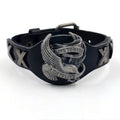 Black leather bracelet with alloy eagle watch-button clasp showing geometric patterning