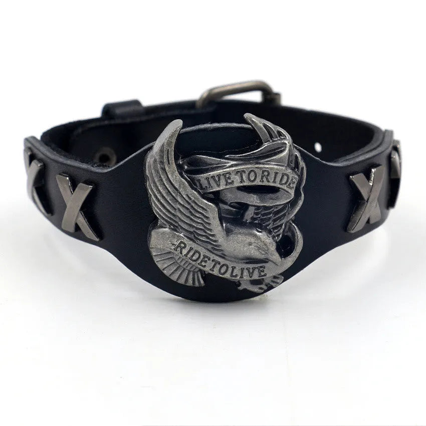 Black leather bracelet with alloy eagle watch-button clasp showing geometric patterning