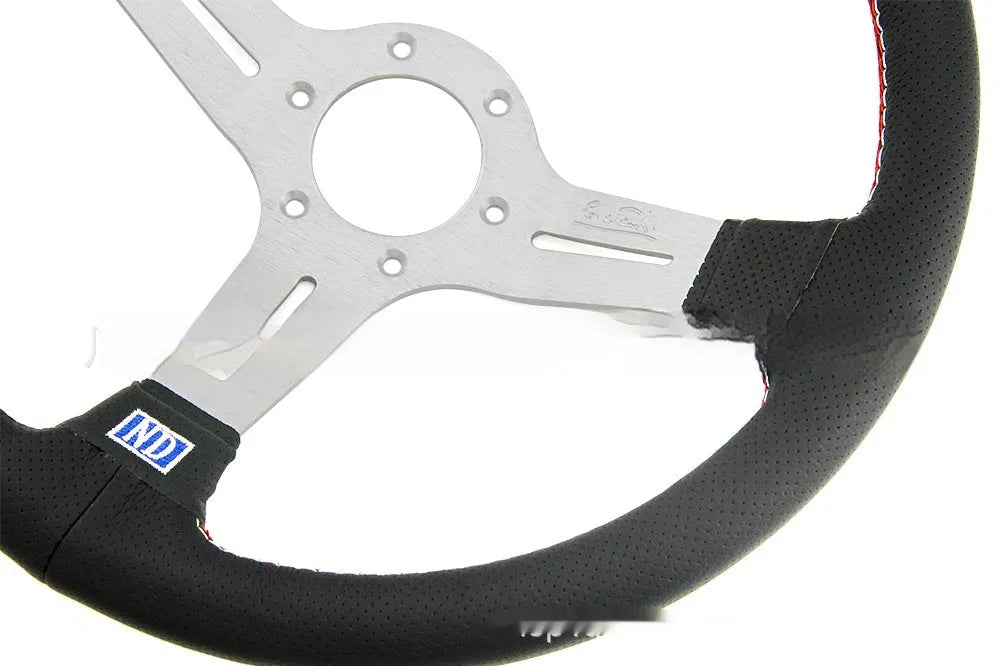 Leather 14-inch steering wheel with concave centre design, black skeleton frame option