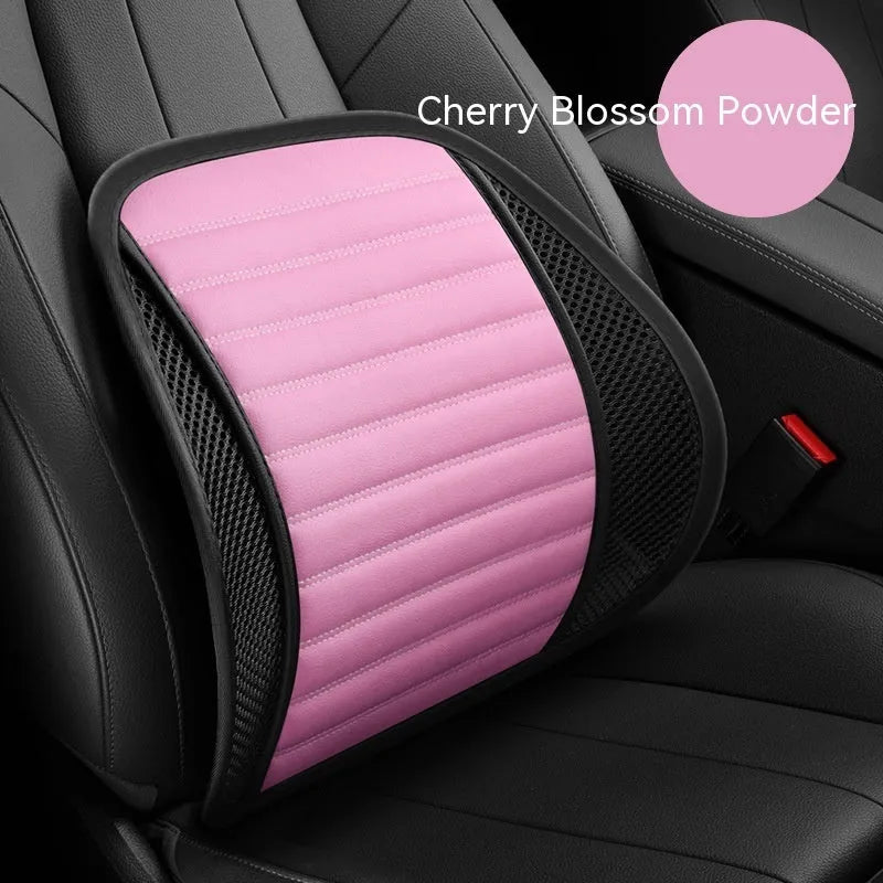Leather lumbar support cushion on car seat in sapphire blue colour