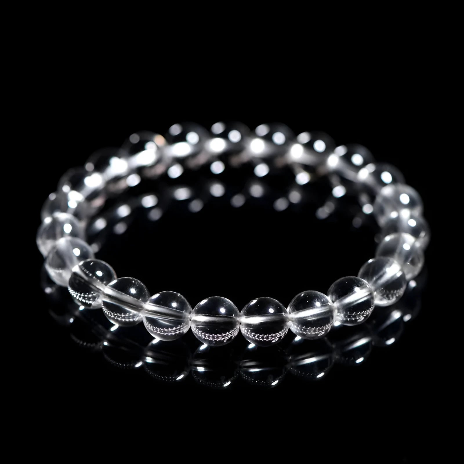 Natural Donghai white crystal bracelet with round water beads on a wrist, showing geometrical unisex design.