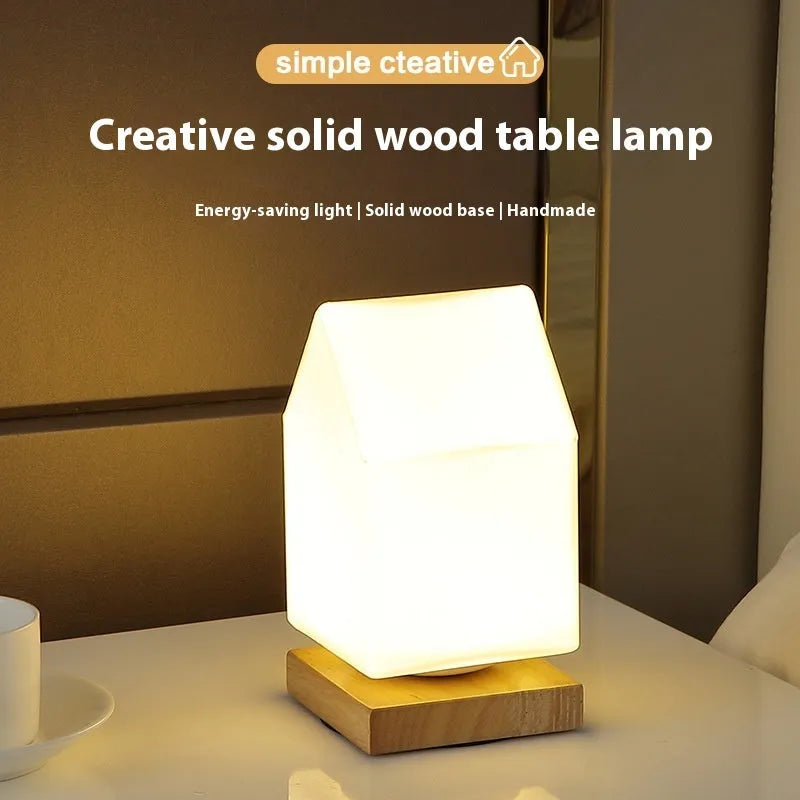 Nordic solid wood USB table lamp with touch dimming in white cube style on wooden surface