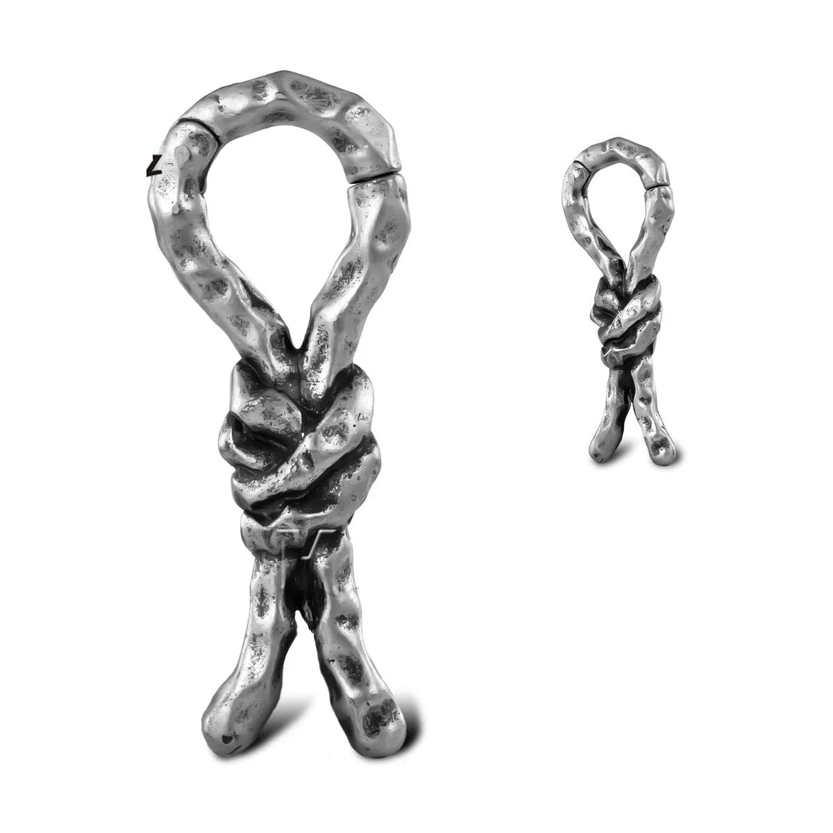 Close-up of copper retro earrings with a bending design for cartilage piercing.