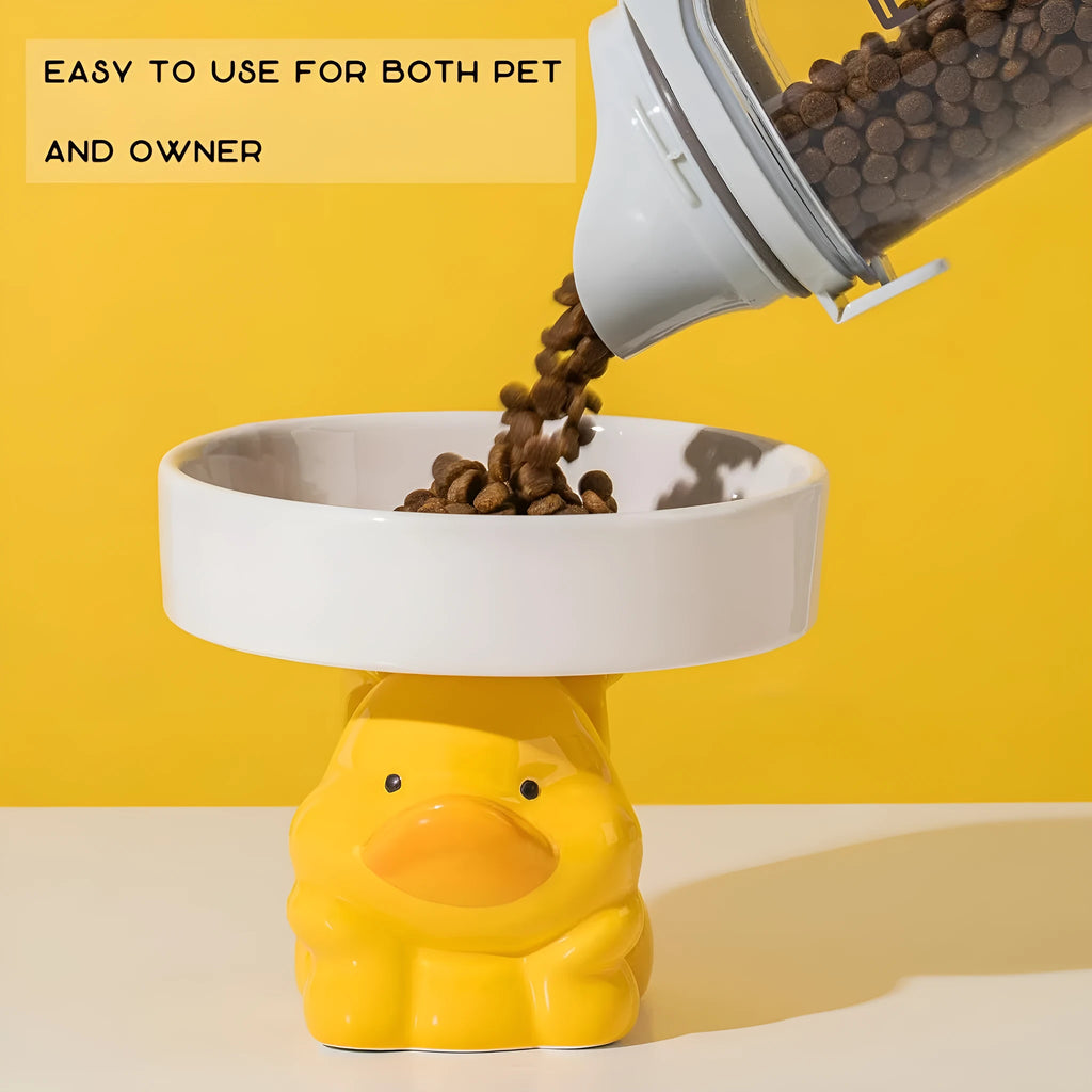 Raised ceramic cat food bowl in animal theme design, showing 12.5cm height and 15cm width.