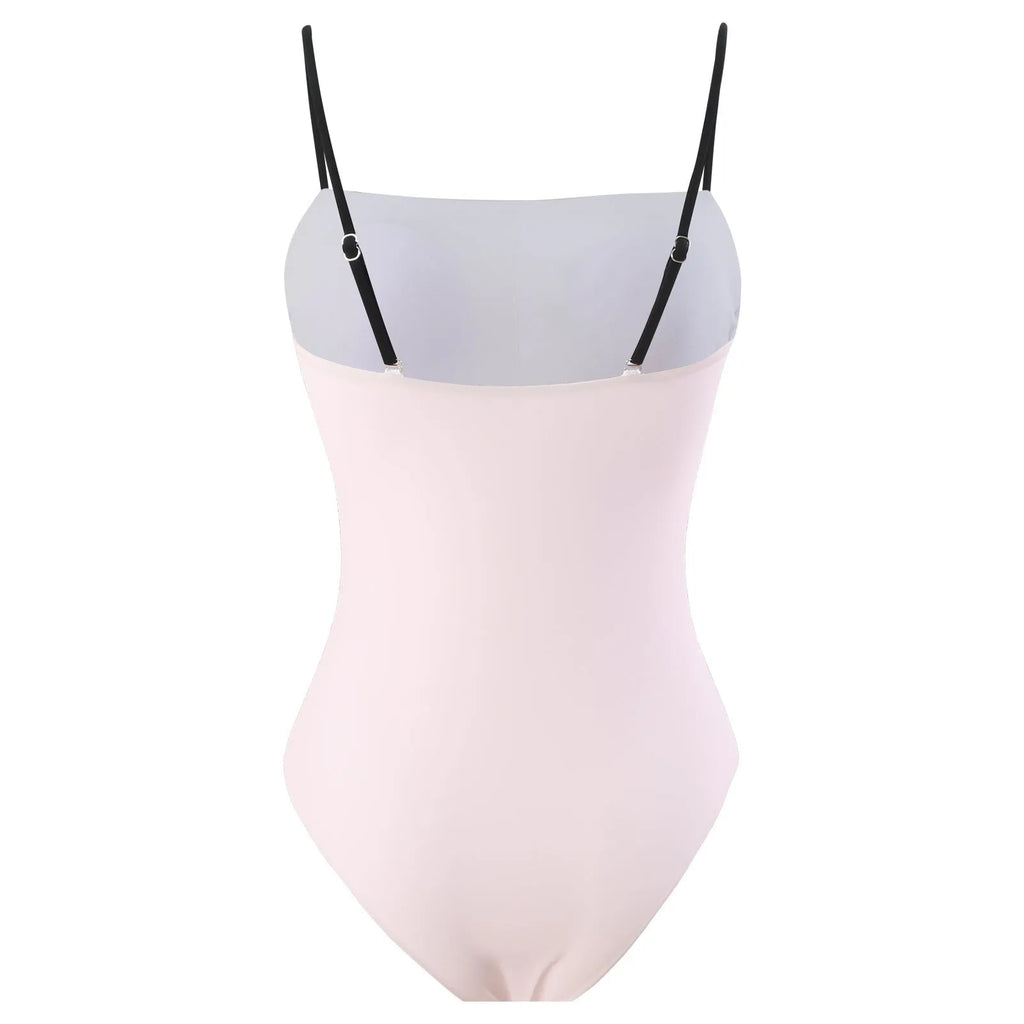 Women's patterned bikini swimsuit with a flowing white tulle skirt attached.