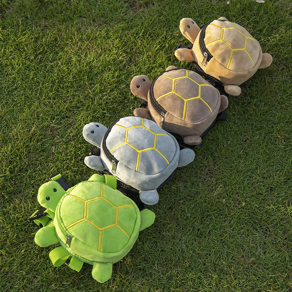 Brown velvet turtle-shaped dog harness with integrated backpack and front metal zipper.