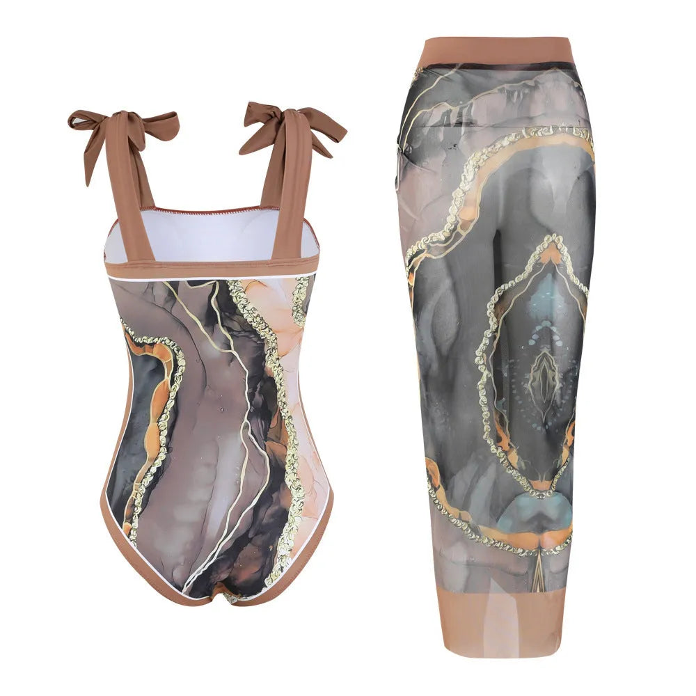 Floral print one-piece swimsuit with mesh tube top and detachable skirt in brown colour