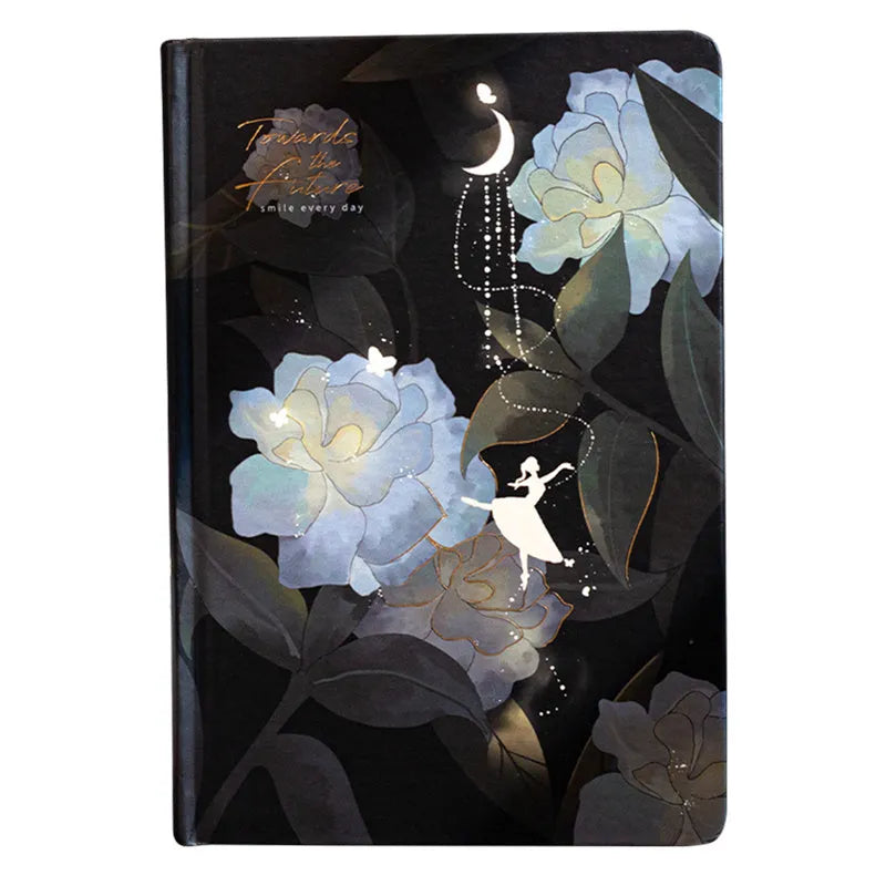 A5 notebook with luminous cover showing colour illustration interior pages and dot grid layout