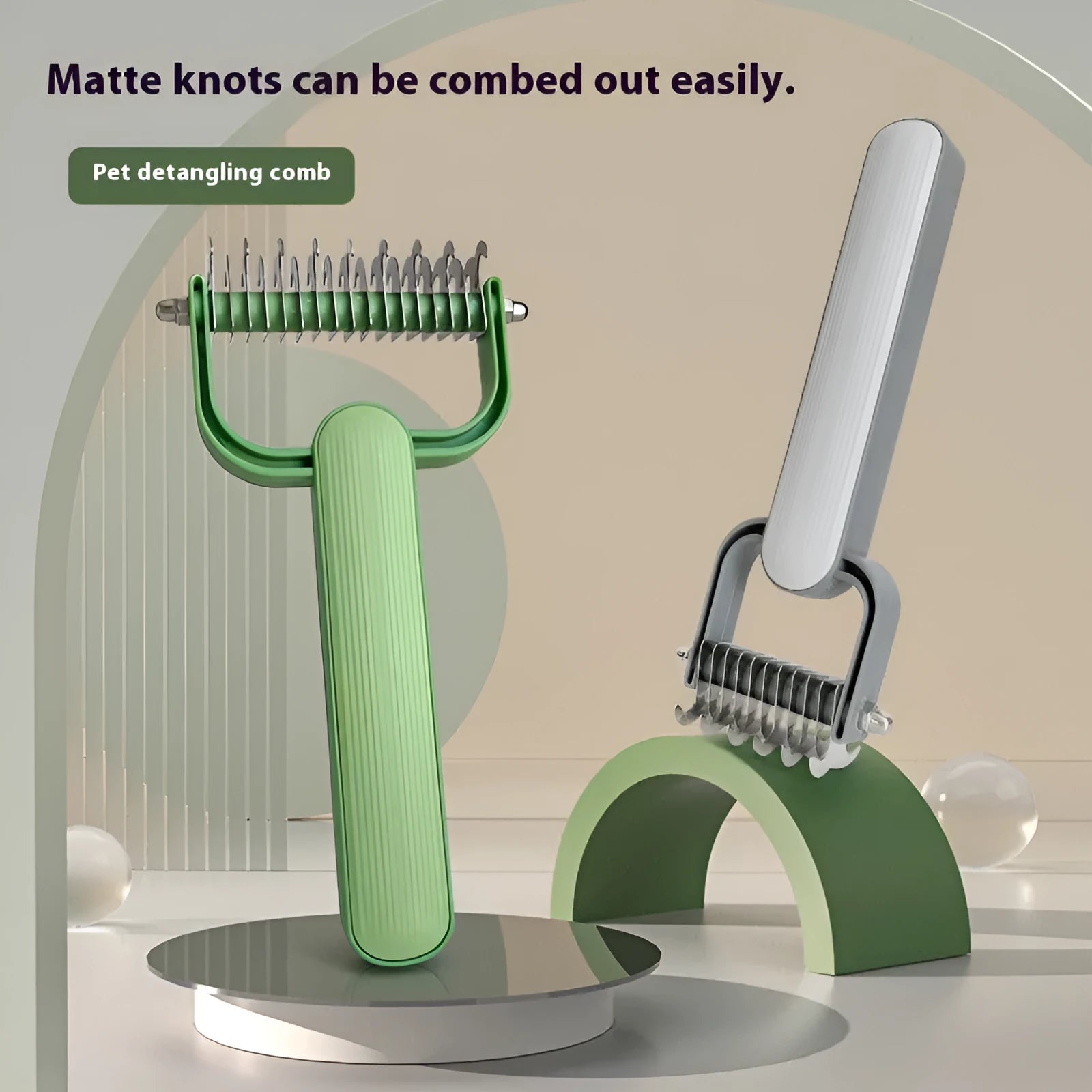 Green and grey dog unknotting comb with stainless steel tines and PP plastic handle