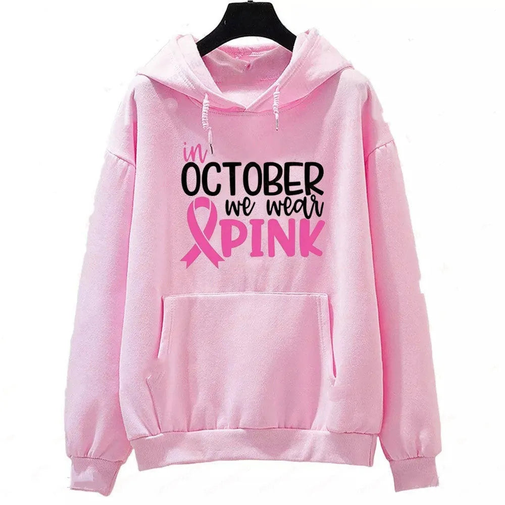 Retro print 'I'm A Survivor' pullover hoodie in street fashion style with side seam pockets.