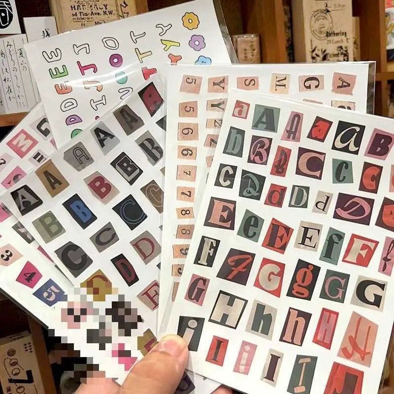Set of printed English letters, numbers, and weekday word stickers in multiple colours for crafts and organisation