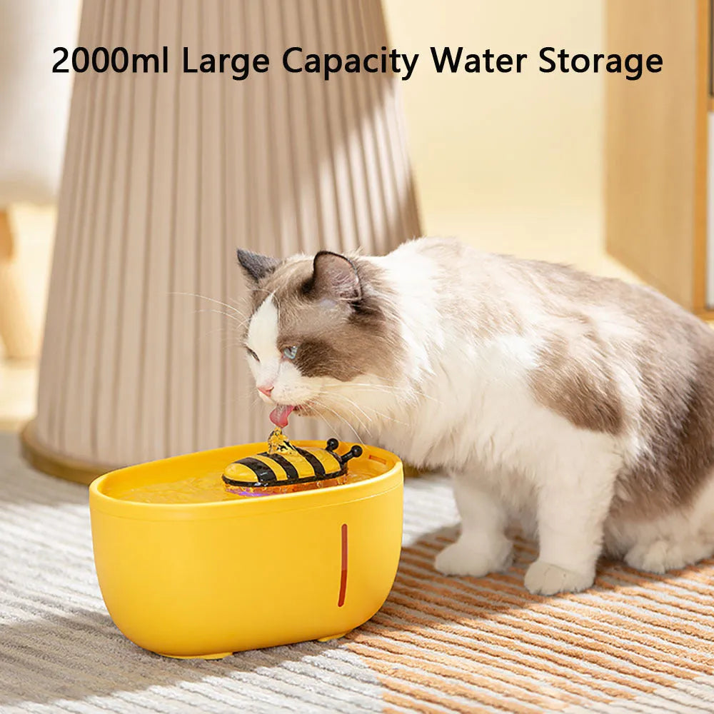 Yellow automatic cat water fountain with filtration system and blue LED light