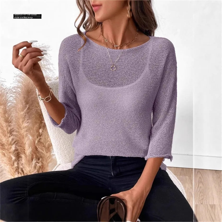 Thin knitted off-shoulder top for women with 3/4 sleeves and a see-through 3D pattern in multiple colour options.