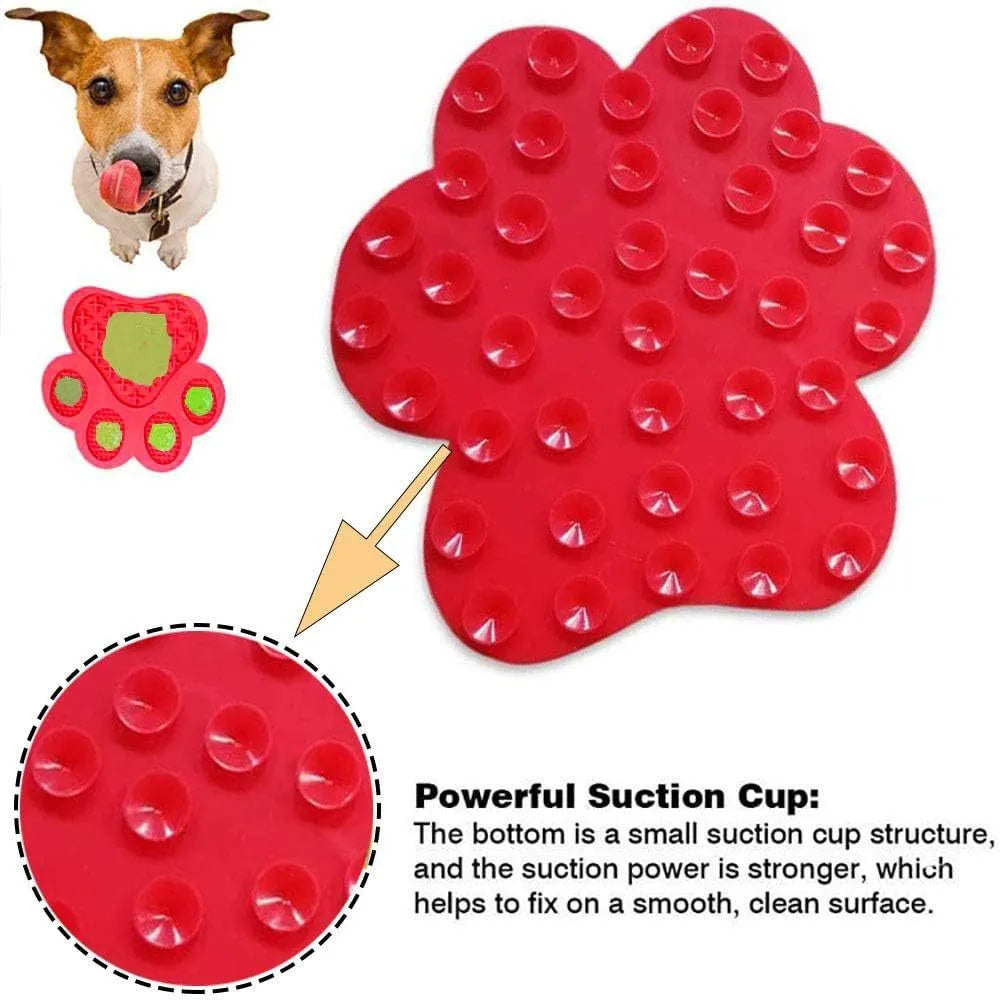 Blue bone-shaped silicone dog licking mat with suction cups on the back for sticking to smooth surfaces.