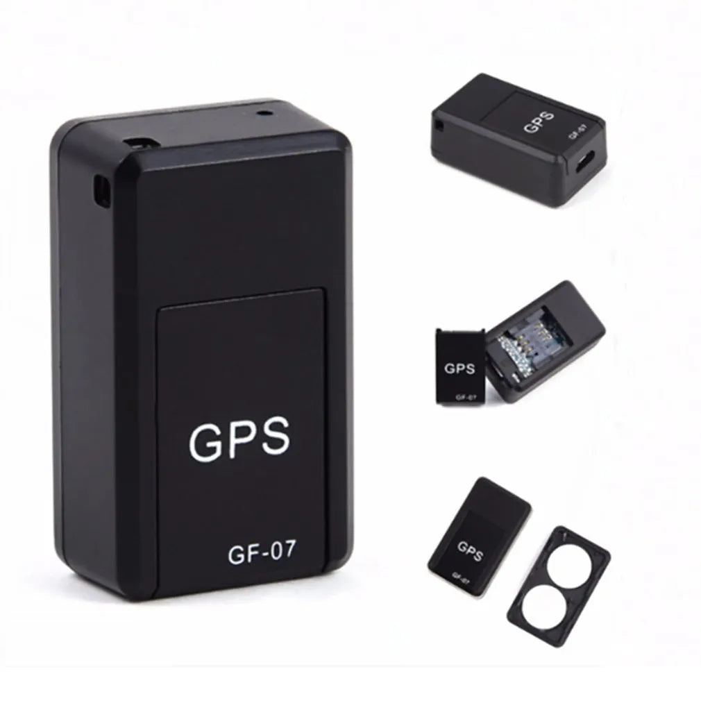Small black magnetic GPS tracker device for cars with a USB charging cable.