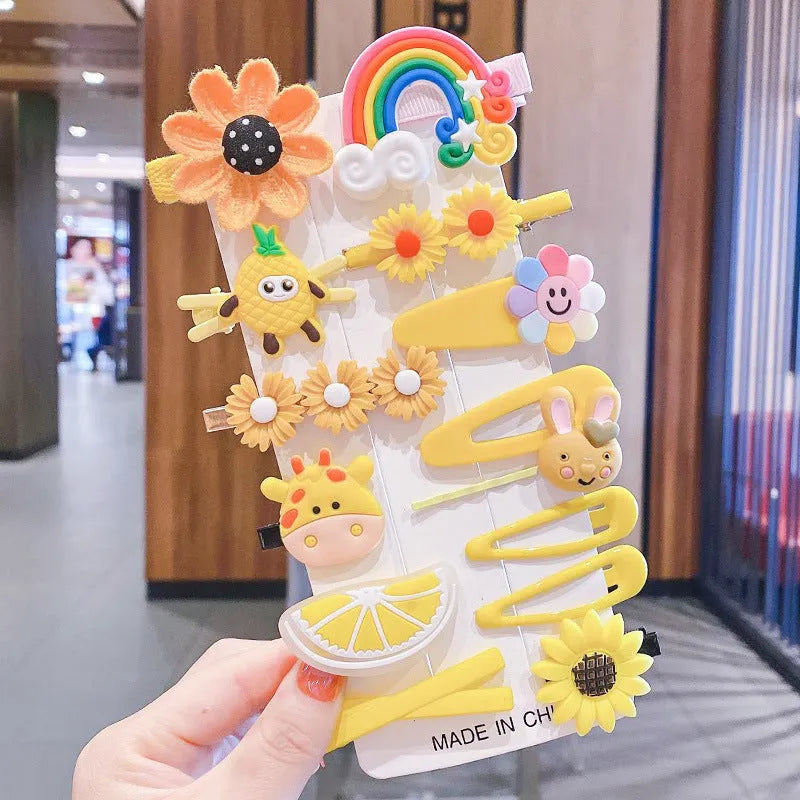 14 piece toddler hair accessories set with rainbow, candy fruit, and butterfly designs in bright colours