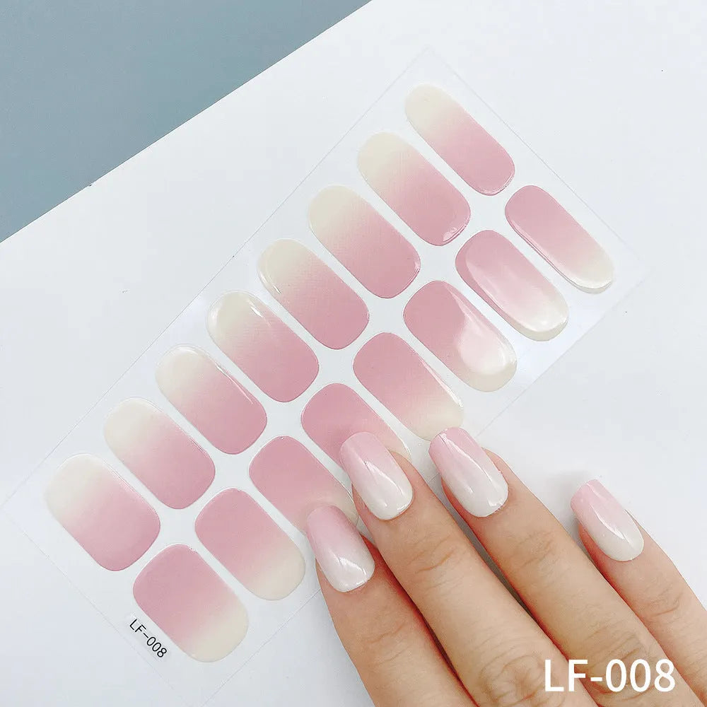 Full coverage nail art stickers sheet with 16 designs including cross, rose, tulip, and cartoon patterns.