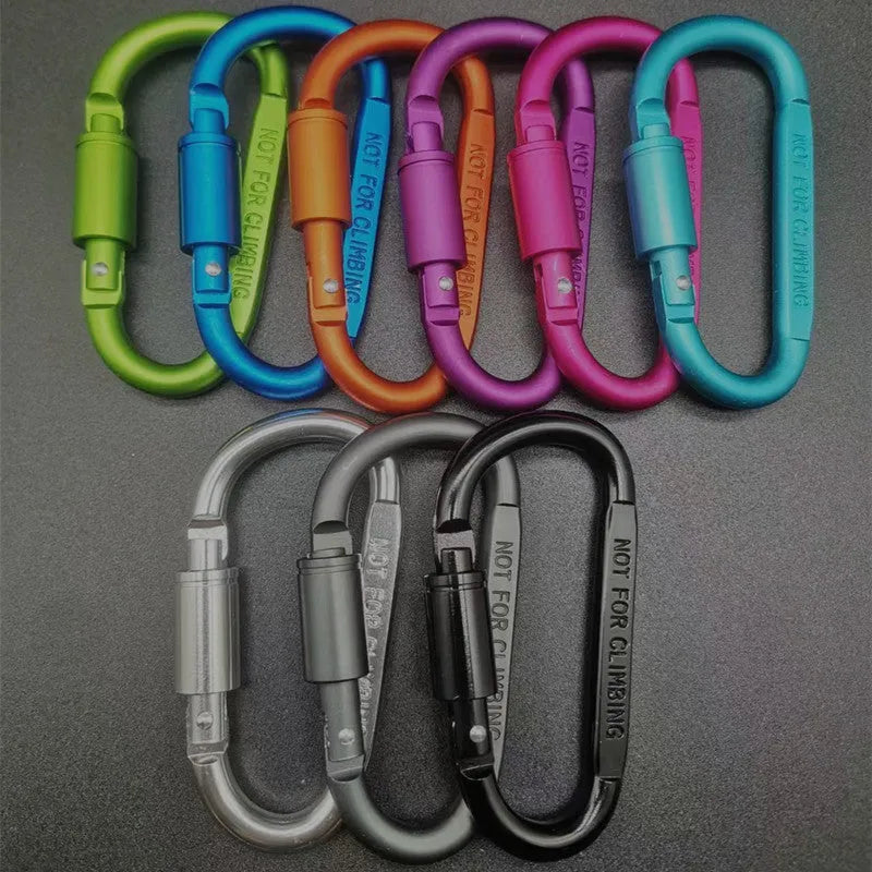 D-type aluminium locking climbing carabiner with screwgate, shown in a bright colour on a grey background.