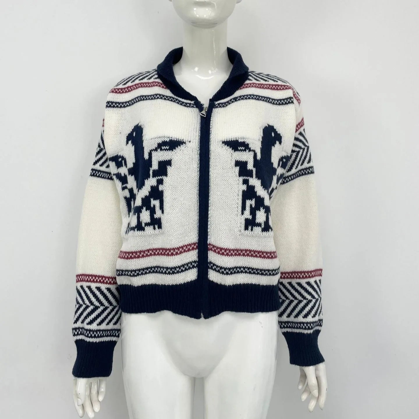 White women's cardigan with contrast stripe pattern, lapel collar, and a full-length front zipper.