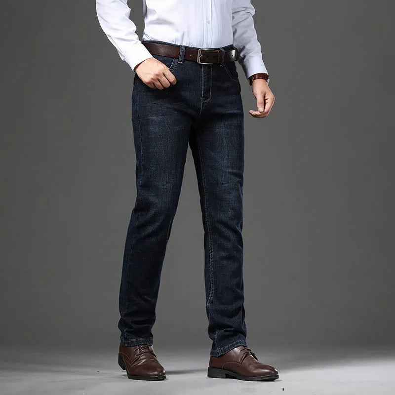 Black and blue loose fit stretch jeans straight-leg trousers on a hanger