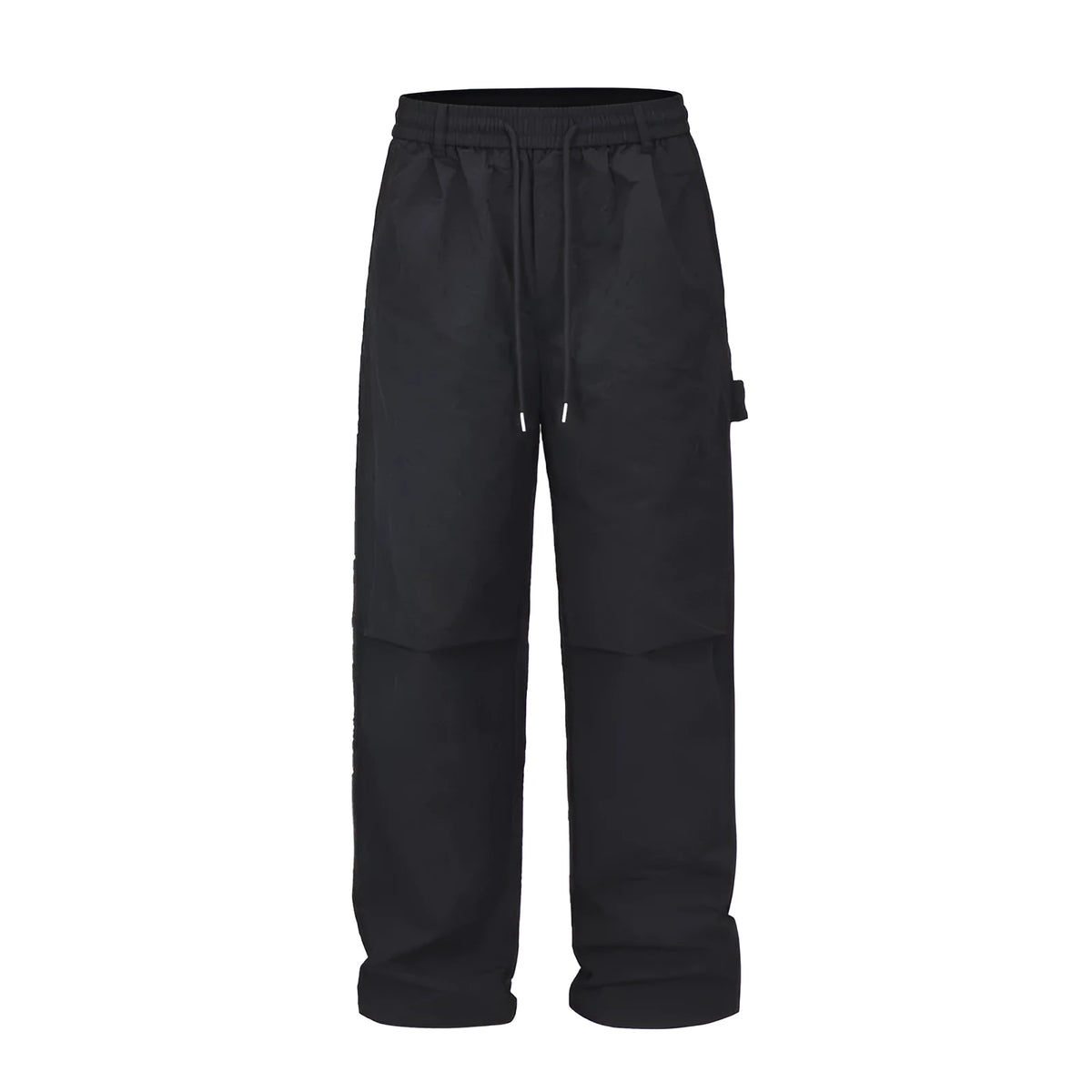 Black paratrooper trousers with elastic waist and drawstring closure, showing baggy fit and three-dimensional cutting