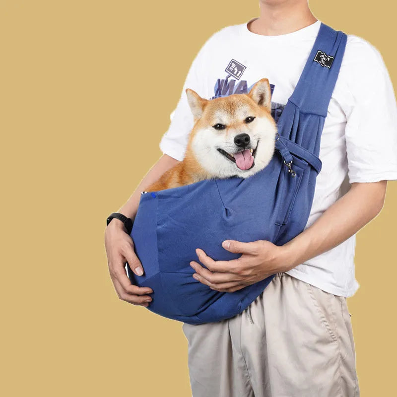 Folding cat messenger backpack with mesh windows, shown in a choice of colours including blue and grey.