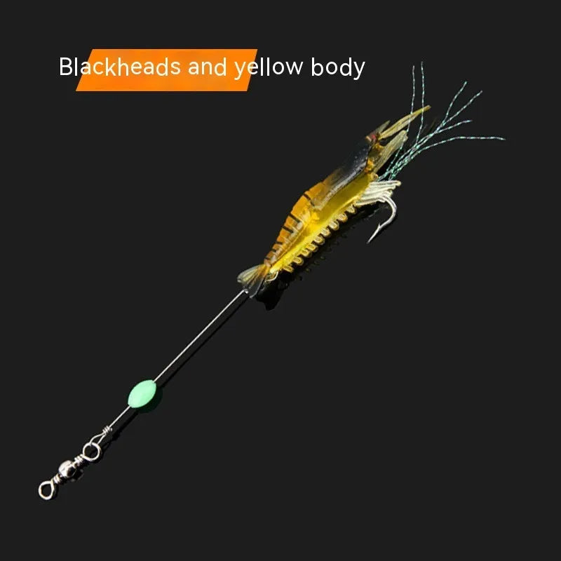 Six soft fishing lures with hooks in colours including black head yellow body, pink luminous, and red head yellow body.