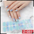 Pack of Korean nail art stickers showing cartoon, strawberry, flower, and bow designs with a nail file.