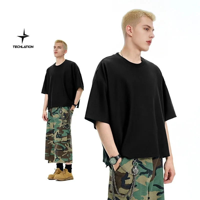 Men's loose fit short sleeve t-shirt in cotton-polyester blend available in black and sand grey colours