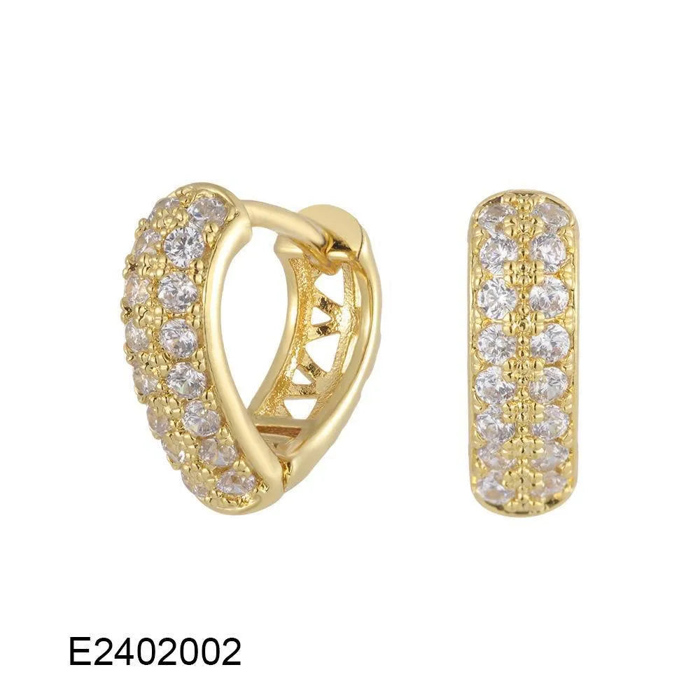 Heart-shaped copper ear clip earrings with brass gold plating and gang drill elements