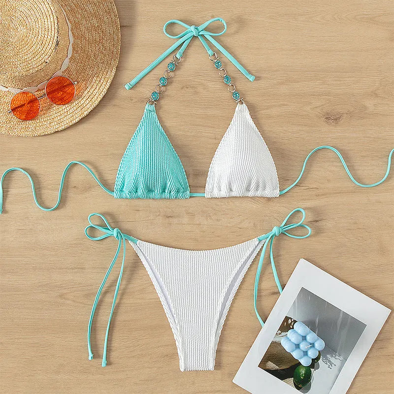 Women's lace-up swimsuit with pearl chain decoration in colour-matching nylon fabric