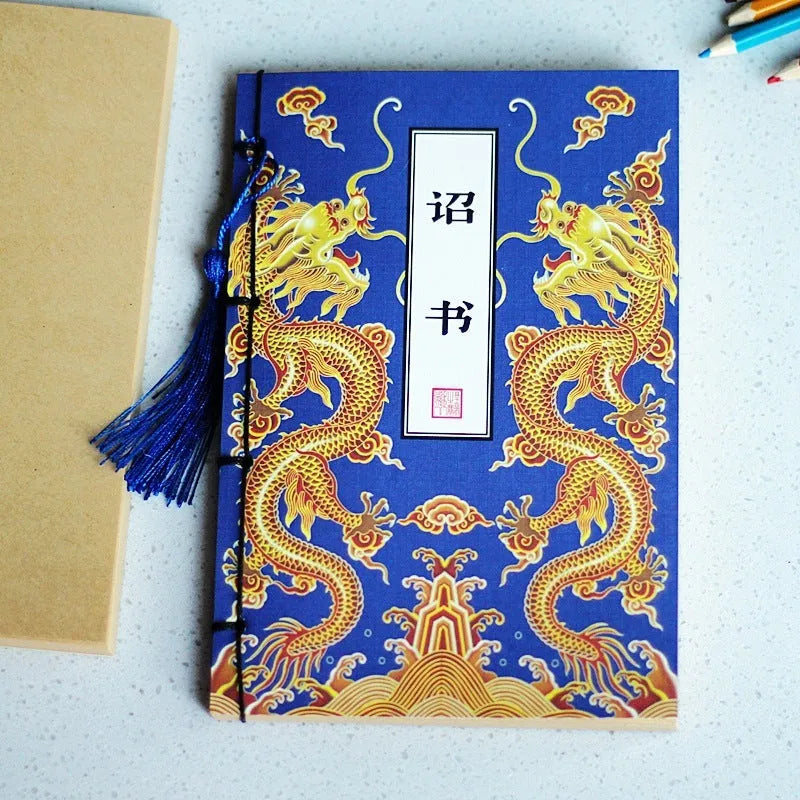 A5 antique wire-bound notebook with retro painting cover, thread binding, and black tassels.
