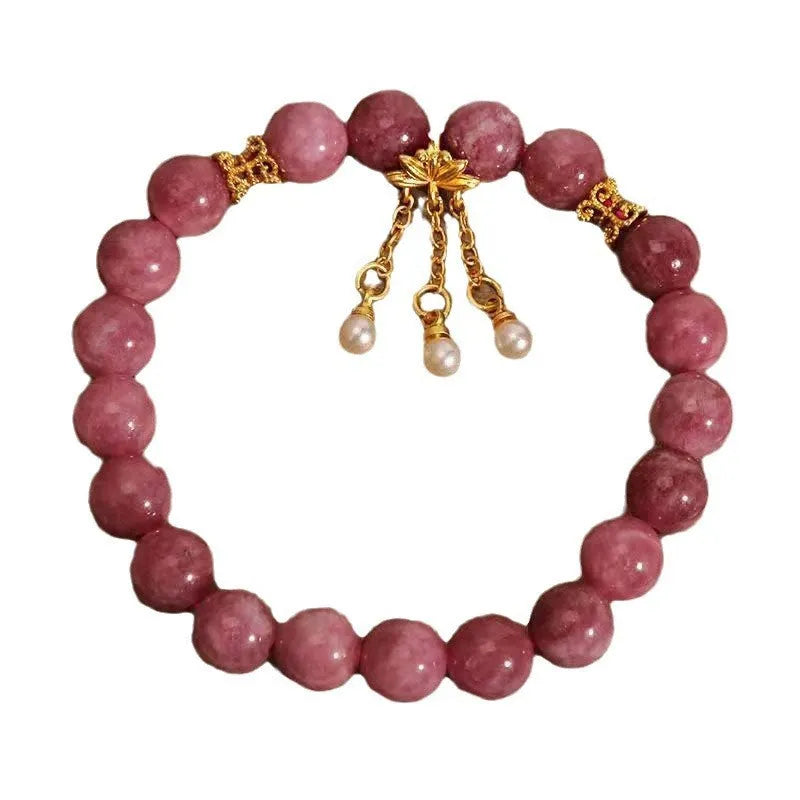 Natural stone bracelet with lotus tassel design, pearl pendant, and electroplated pink finish