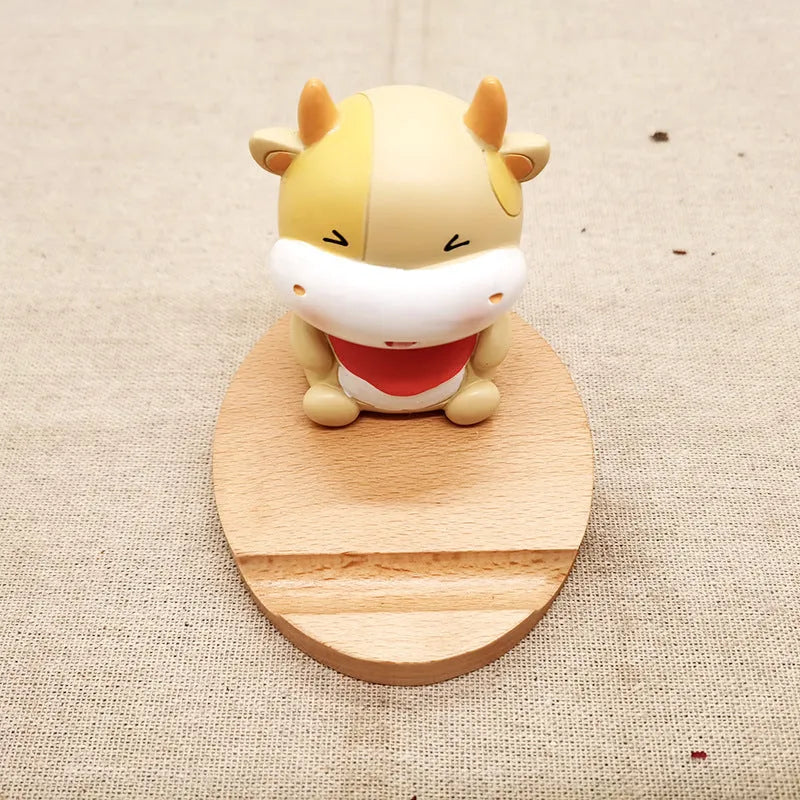 Resin animal-themed mobile phone holder with lazy bracket design for desk organisation
