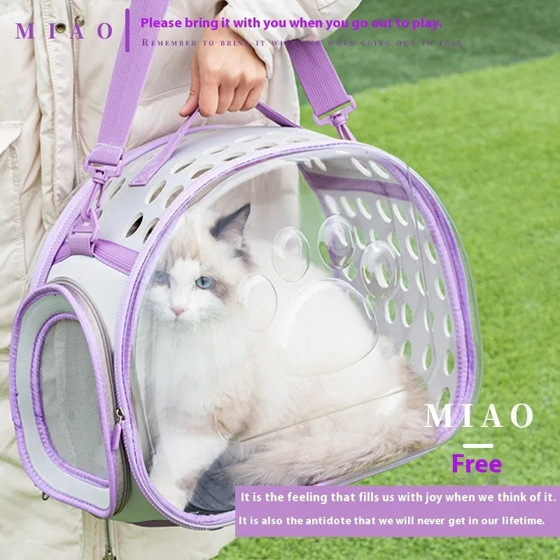 A large transparent hard-shell cat backpack in grass green, shown with dimensions for a pet up to 9kg.