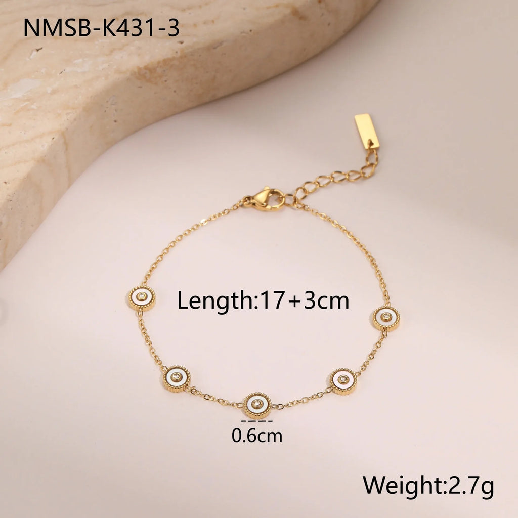 Geometric design women's jewellery set with bracelet and necklace in gold-plated stainless steel
