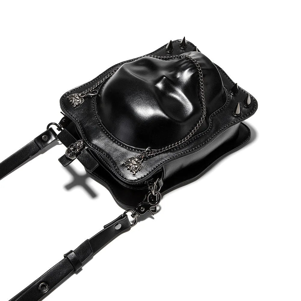 Black gothic skull shoulder bag with square messenger shape and decorative metal details