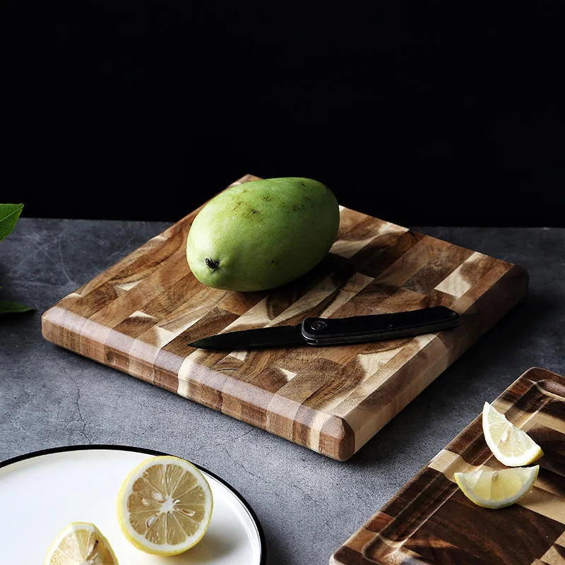 Brown acacia solid wood chopping board with parquet pattern, showing 3cm side thickness.