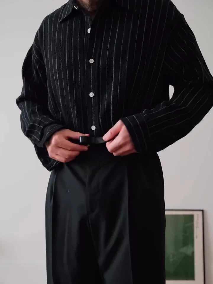Black and white pinstriped men's long sleeve button-down shirt with a regular fit.