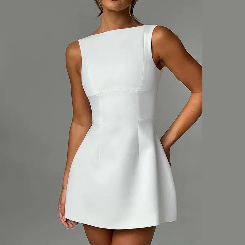 Slim-fitting black backless sleeveless summer dress with high waist on a model.