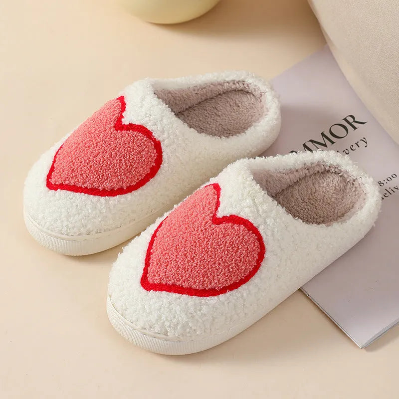Women's plush cartoon love style slippers with non-slip PVC sole in Big Love pattern.