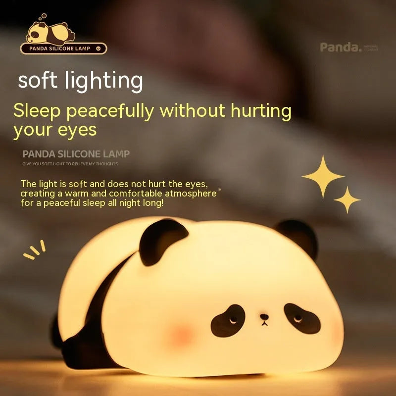 Panda-shaped night light with warm white LED glow and silicone construction