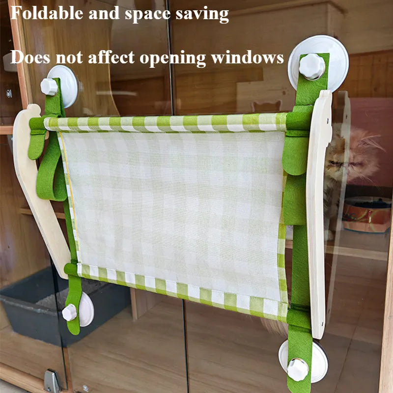 Wooden cat window hammock with linen fabric attached to window using suction cups