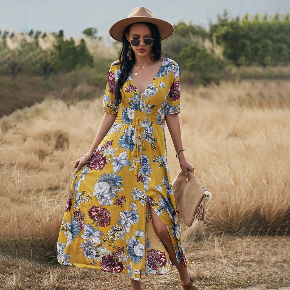 Yellow floral print women's summer dress with V-neck, short sleeves, and elasticated waist
