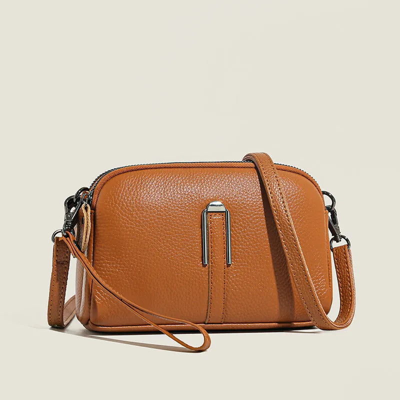 Women's genuine leather square shoulder bag in black with first layer cowhide construction measuring 19x13x6cm