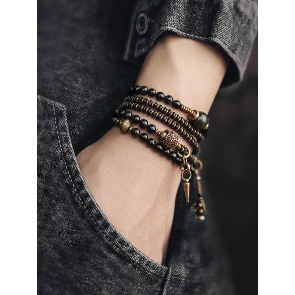 Black multi-layered bracelet with colourful geometric beads in retro design